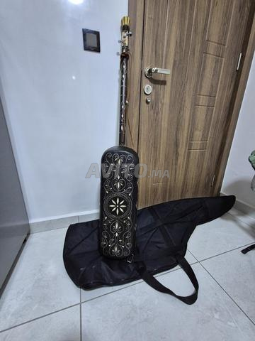 gnawa genbri guembri guembri en saule sculpté et gravé