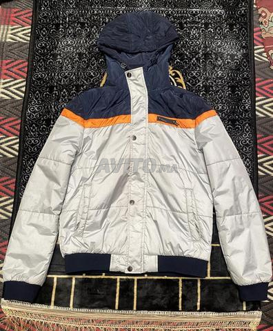 Veste d'hiver doublée avec capuche chaude - élégante en excellent état