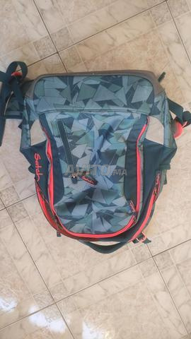 ساتش حقيبة ظهر مدرسية