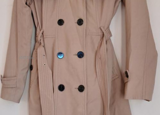 Manteau en tissu gras