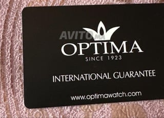 Montre suisse optima osm433 neuve