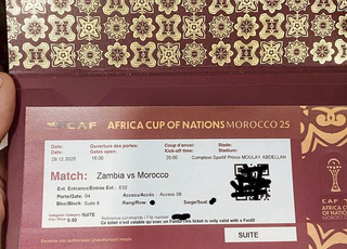 Ticket suite avec macaron