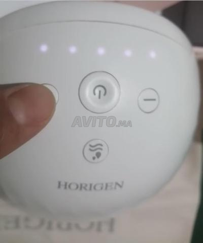 مضخة حليب كهربائية بدون استخدام اليدين Horigen