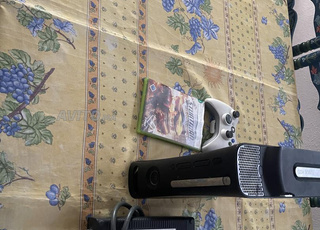 Xbox 360 etat bon 1 manette et jeu