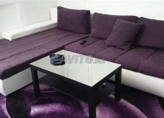 كنبة زاوية قابلة للتحويل.