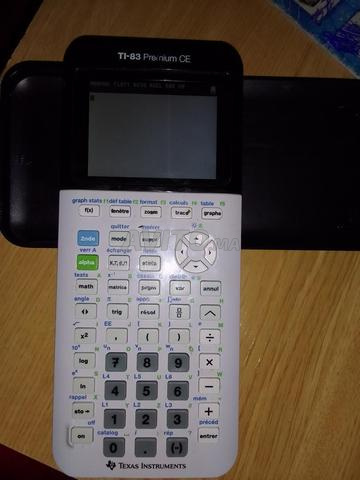 TI-83 ORIGINALE -GRAPHIQUE-ETAT IMPECCABLE