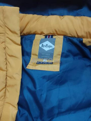 سترة مبطنة بغطاء للرأس