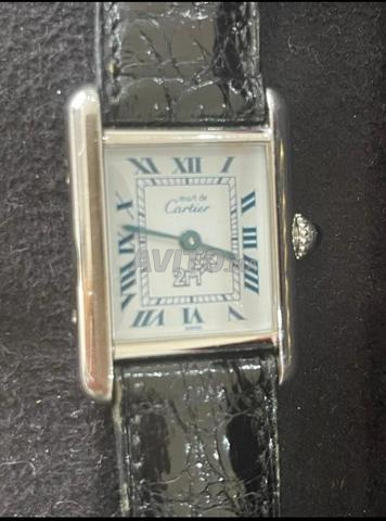 ساعة كارتييه تانك. شعار 2M