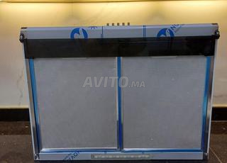 Cuisinière et Hotte aspirante neuve Très bon état