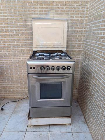 طباخة وغطاء شفاط جديد بحالة جيدة جدا