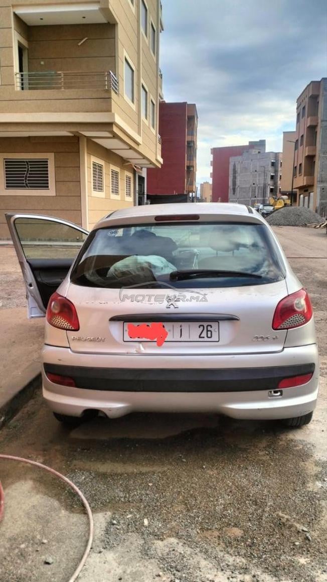 Peugeot 206 Plus Essence fin 2011 سيارة نقية
