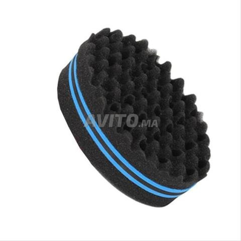 إسفنجة للشعر المجعد