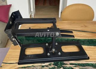 حامل تلفزيون جداري