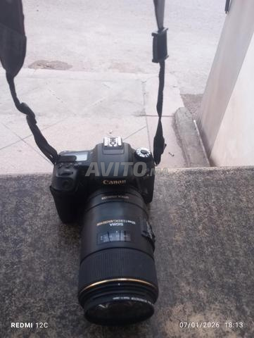 📸 كاميرا Canon DSLR مع عدسة SIGMA احترافية