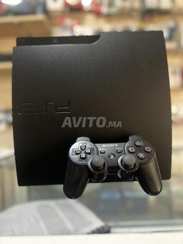 Ps3 slim flashé avec 2 Manette Original