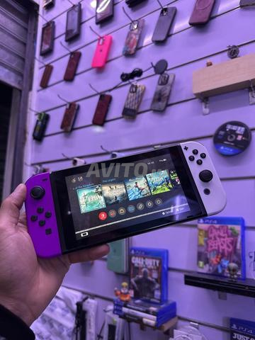 نينتندو سويتش (v2) مفلاش 128 جيجابايت - مليء بالألعاب