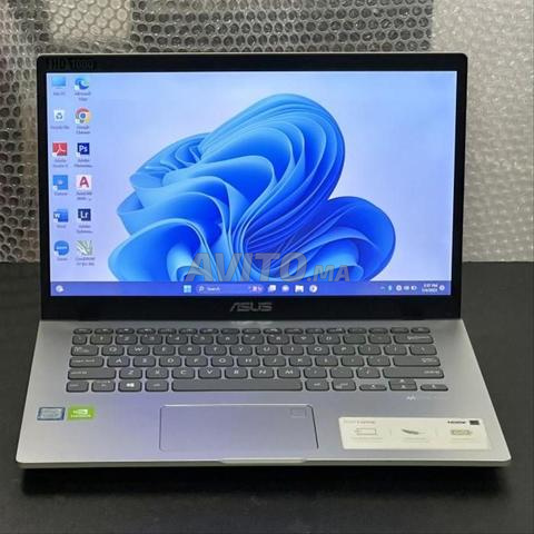 Laptop ASUS avec clavier et souris