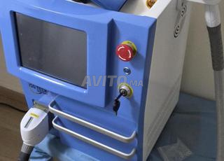 ليزر Q SWITCH لإزالة الوشم