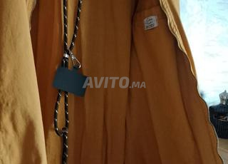 جاكيت سترة ستار تير صفراء ديال برا