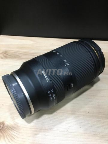 تامرون 28-200 مم f2.8 Di III RXD Sony E حالة جديدة
