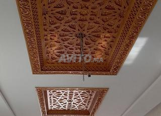 Menuiserie artisanale bois sculpté et moderne