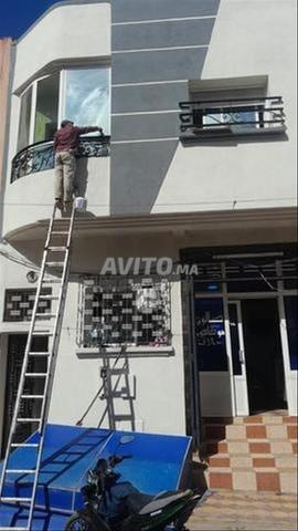 منزل مع محل