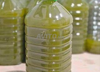 زيت زيتون أصلية معصورة تقليديا من عطاوية