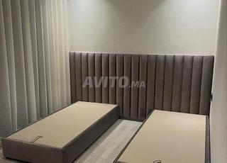 🛏️ 2 lits simples avec tête de lit design