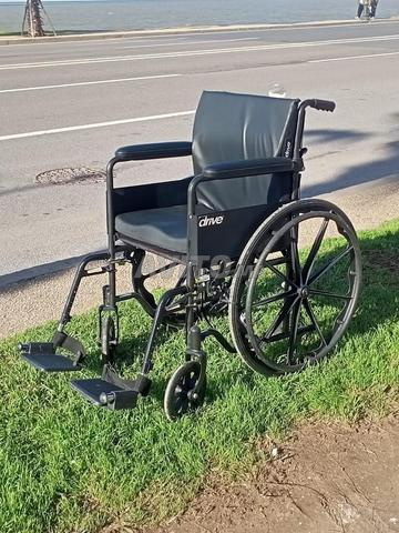 كرسي متحرك من الألومنيوم