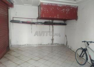 محل للبيع في مركز تجاري