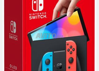 سويتش نينتندو OLED مع لعبتين
