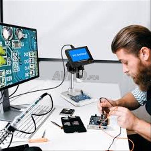 مجهر بتقريب 500 إلى 1000X