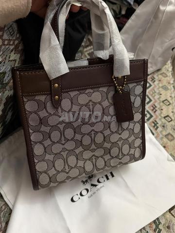 حقيبة كوتش جديدة