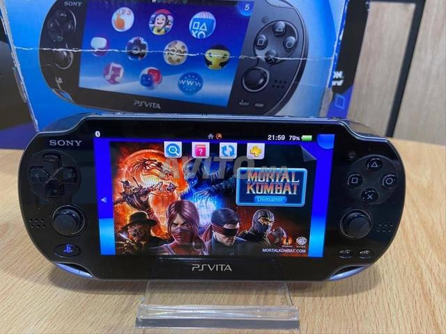 بلاي ستيشن فيتا OLED كالجديد مع شاحن أصلي