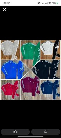 طقم نايك أديداس التوصيل بالمجان