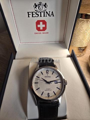 ساعة فيستينا سويسرية الصنع