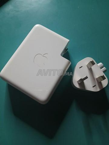 محول Apple USB-C بقوة 140 واط مع كابل أبيض