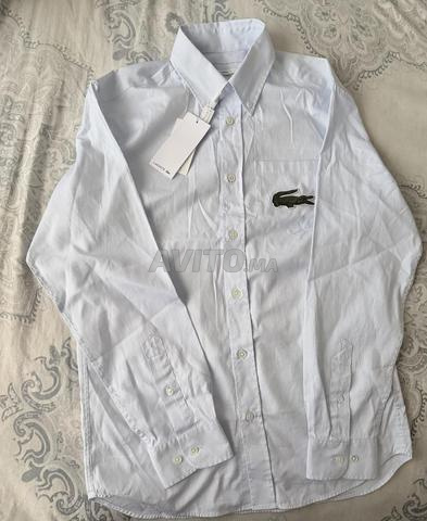 Chemise lacoste unisex taille Xs