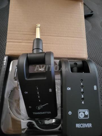 جهاز إرسال لاسلكي للجيتار والكمان