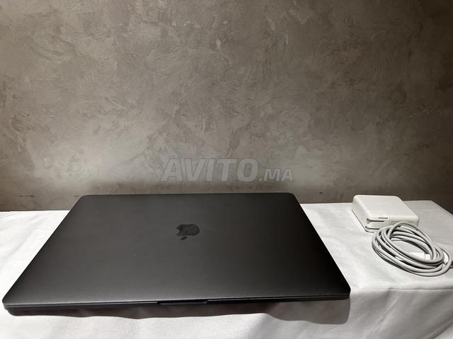 MacBook Pro 2019 i9 32gb Ram / 1to / 38 cycle - 2