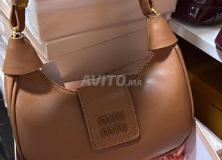 حقيبة أنيقة Miu Miu MM6540