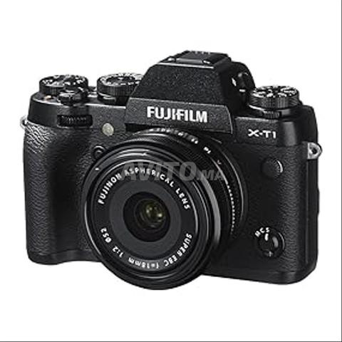 كاميرا fujifilm xt-1 مع عدسة 18 2.0