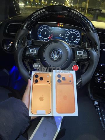 Iphone 17 pro comme neuf orange