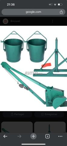 رافعة نقل مع دلاء ومحرك