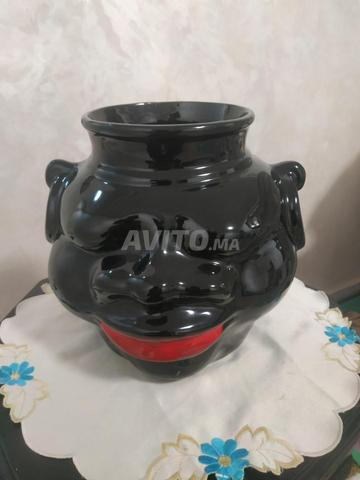 مزهرية - وعاء زهور على شكل رأس زنجي