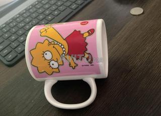 كوب لهواة الجمع سلسلة عائلة سيمبسون - ليزا "SMART GIRL" من حقبة الألفينيات