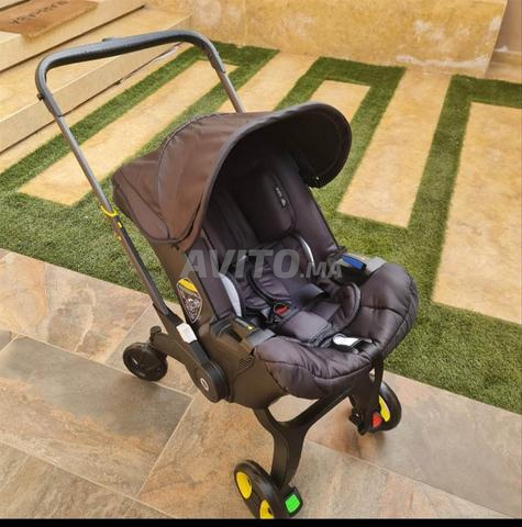 عربة أطفال دونا الأصلية