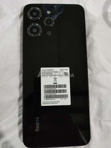 mrhba Redmi 12 téle ba9i jdid li bghah