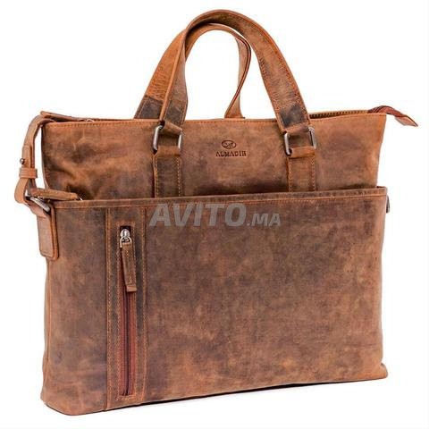 حقيبة جلد طبيعي أصلية للكمبيوتر المحمول.