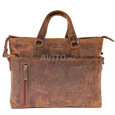 حقيبة جلد طبيعي أصلية للكمبيوتر المحمول.